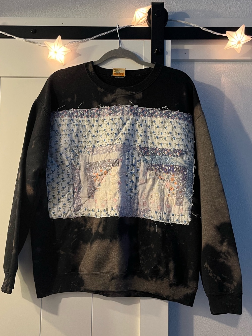 Upcycled Black Crewneck Sweatshirt with Patchwork Floral Panel